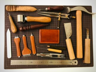 a variety of tools laid out on a cutting board