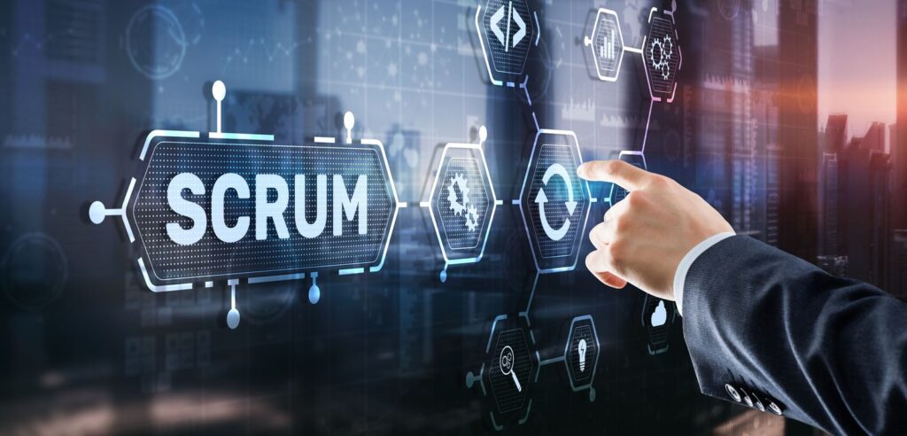 Hand tippt auf eine digitale Prozessgrafik mit dem Schriftzug Scrum